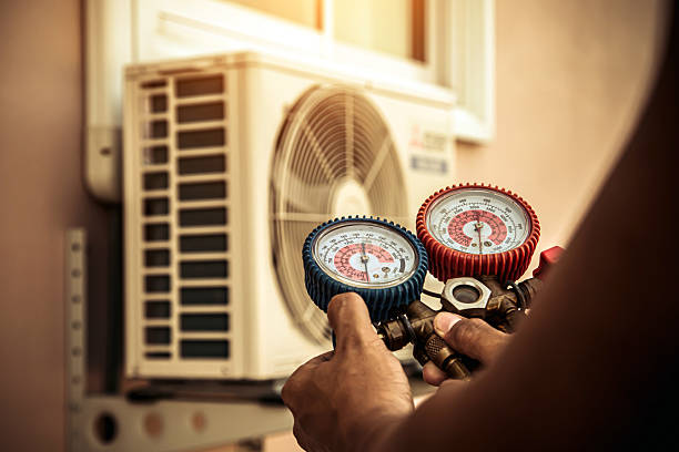 Professional Heat Pump Repair technician working in Evergreen, CO